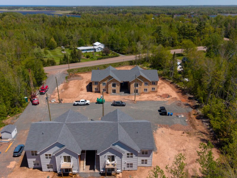 Creamery Landing apartment buildings with Tatamagouche Bay in the background
