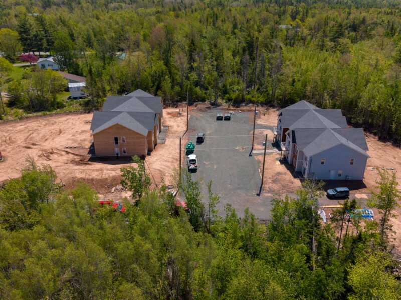 Creamery Landing multi-unit buildings seen by drone from the roadside in Tatamagouche